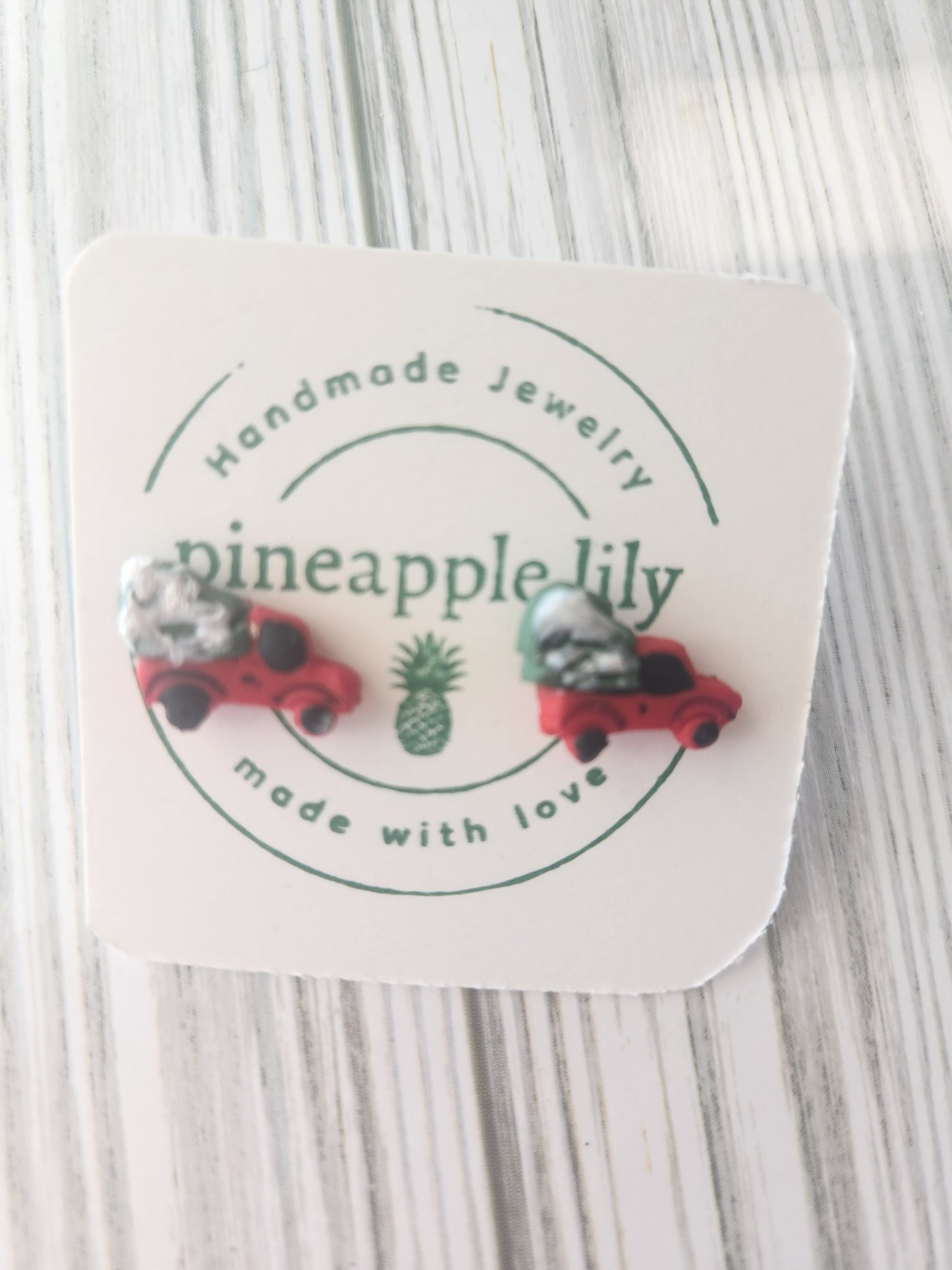 Red truck with christmas tree studs