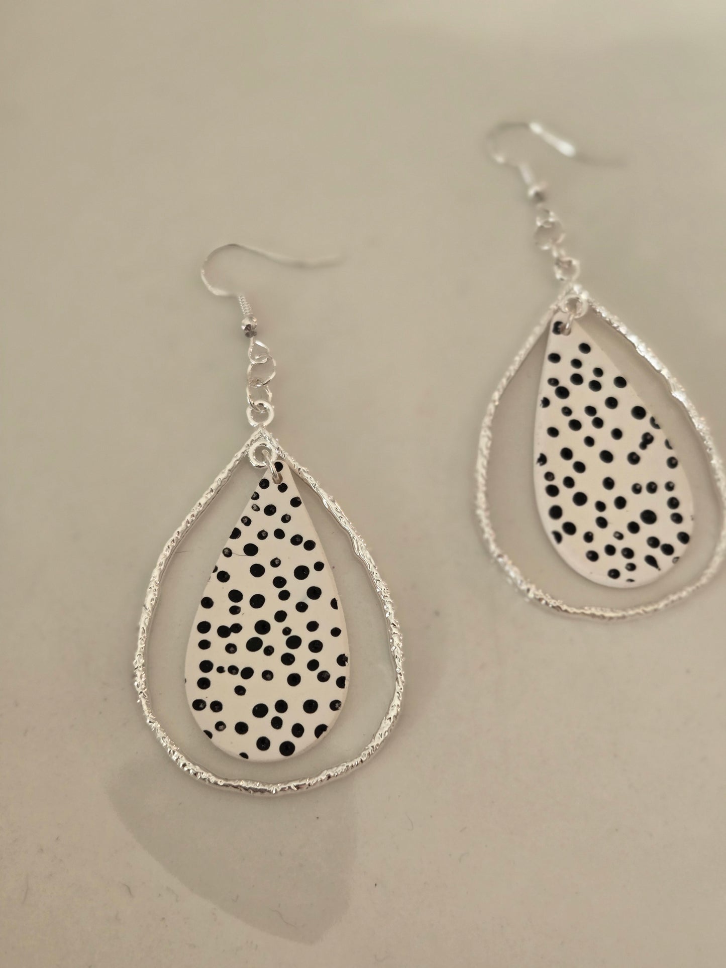 Black and white polka dots statement earrings