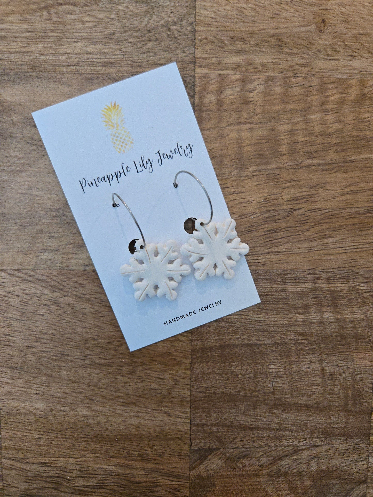 Snowflake hoop earrings