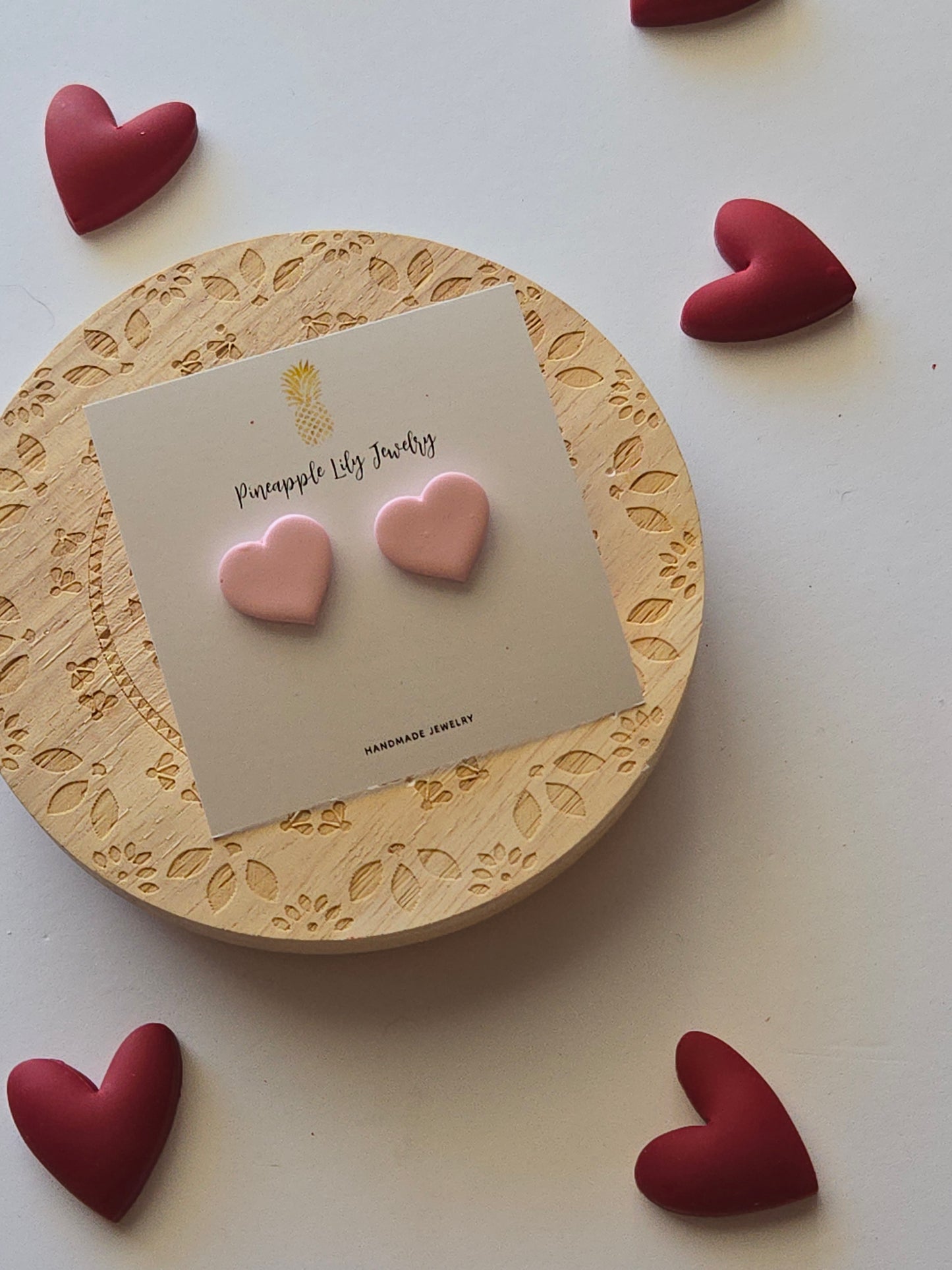 Light pink heart studs