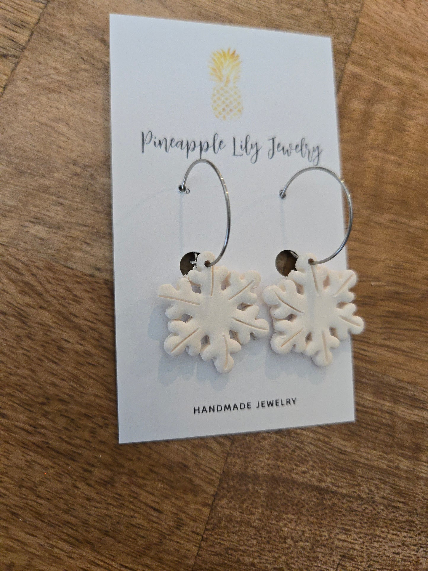 Snowflake hoop earrings