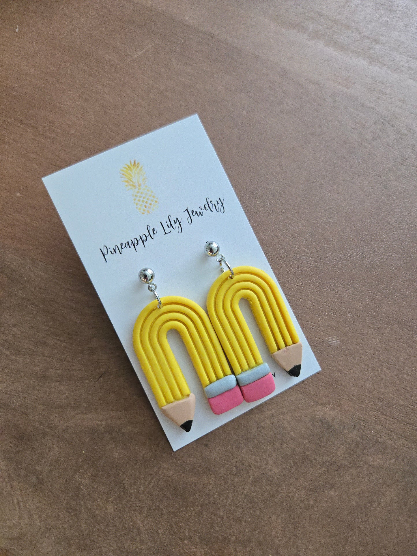 Pencil dangle earrings