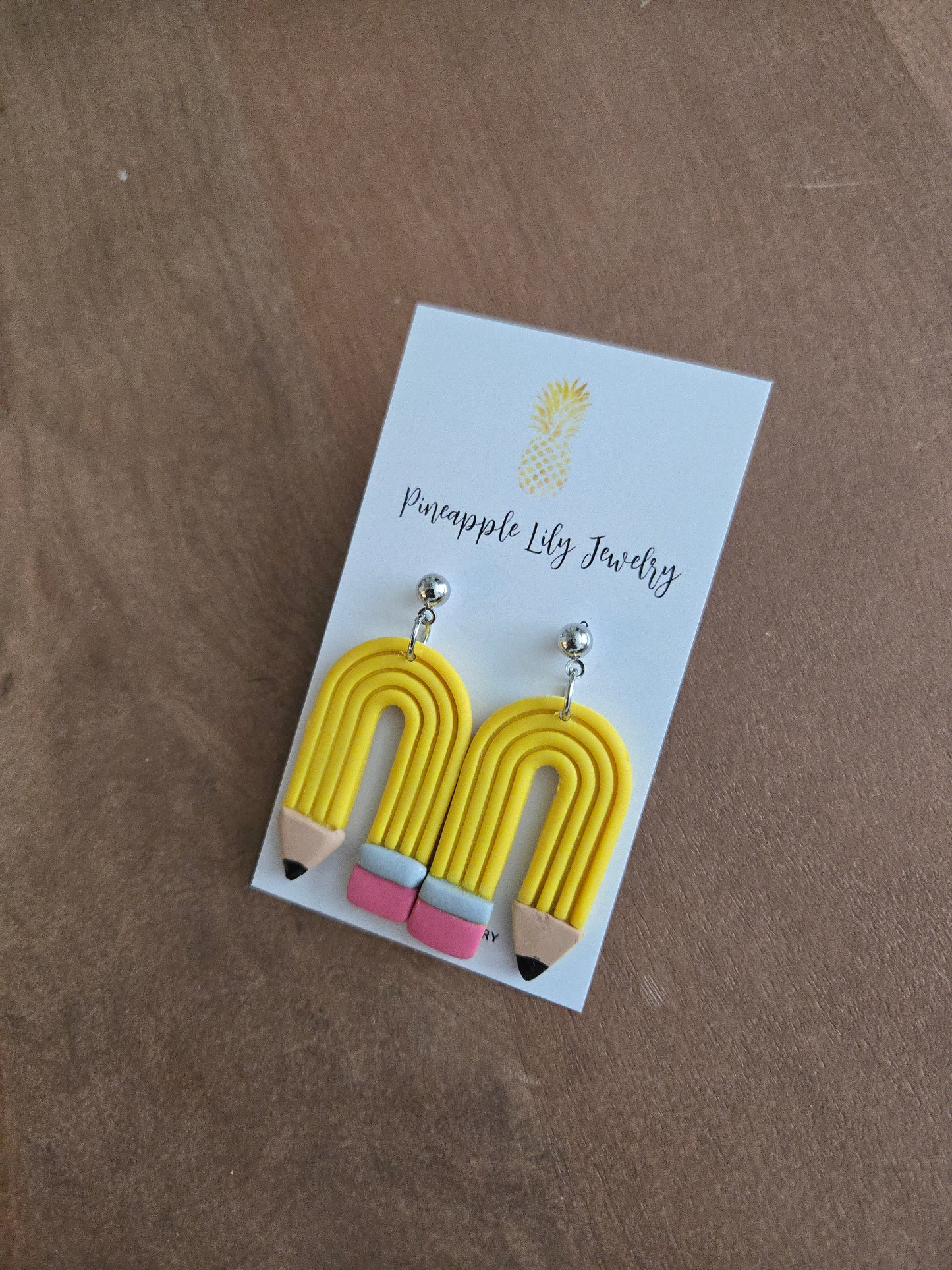 Pencil dangle earrings