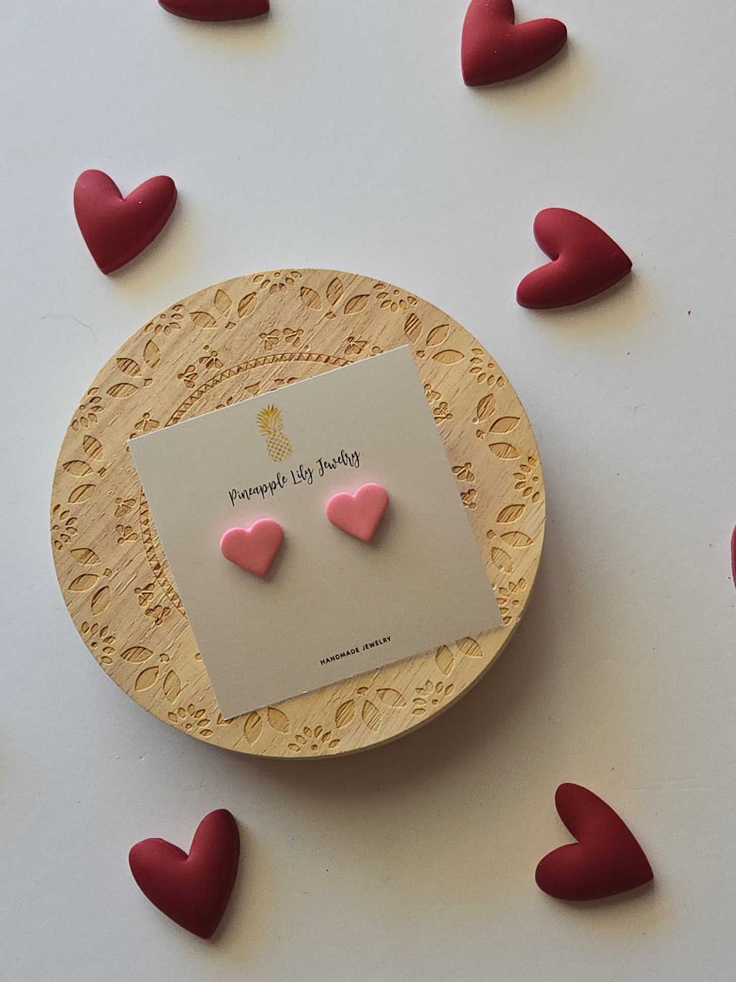 Pink heart studs