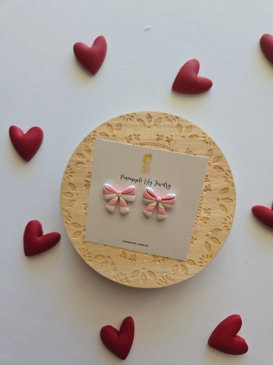 Pink and white stripe bow studs