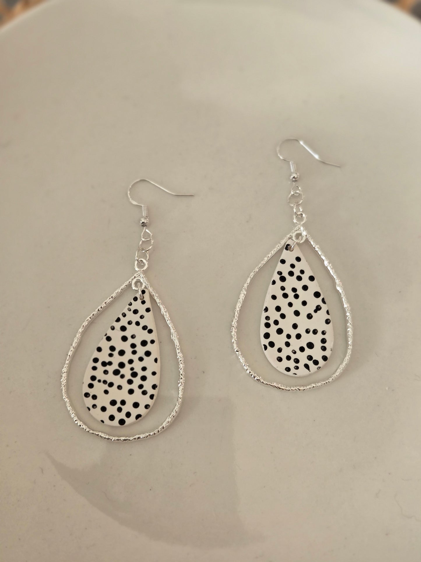 Black and white polka dots statement earrings