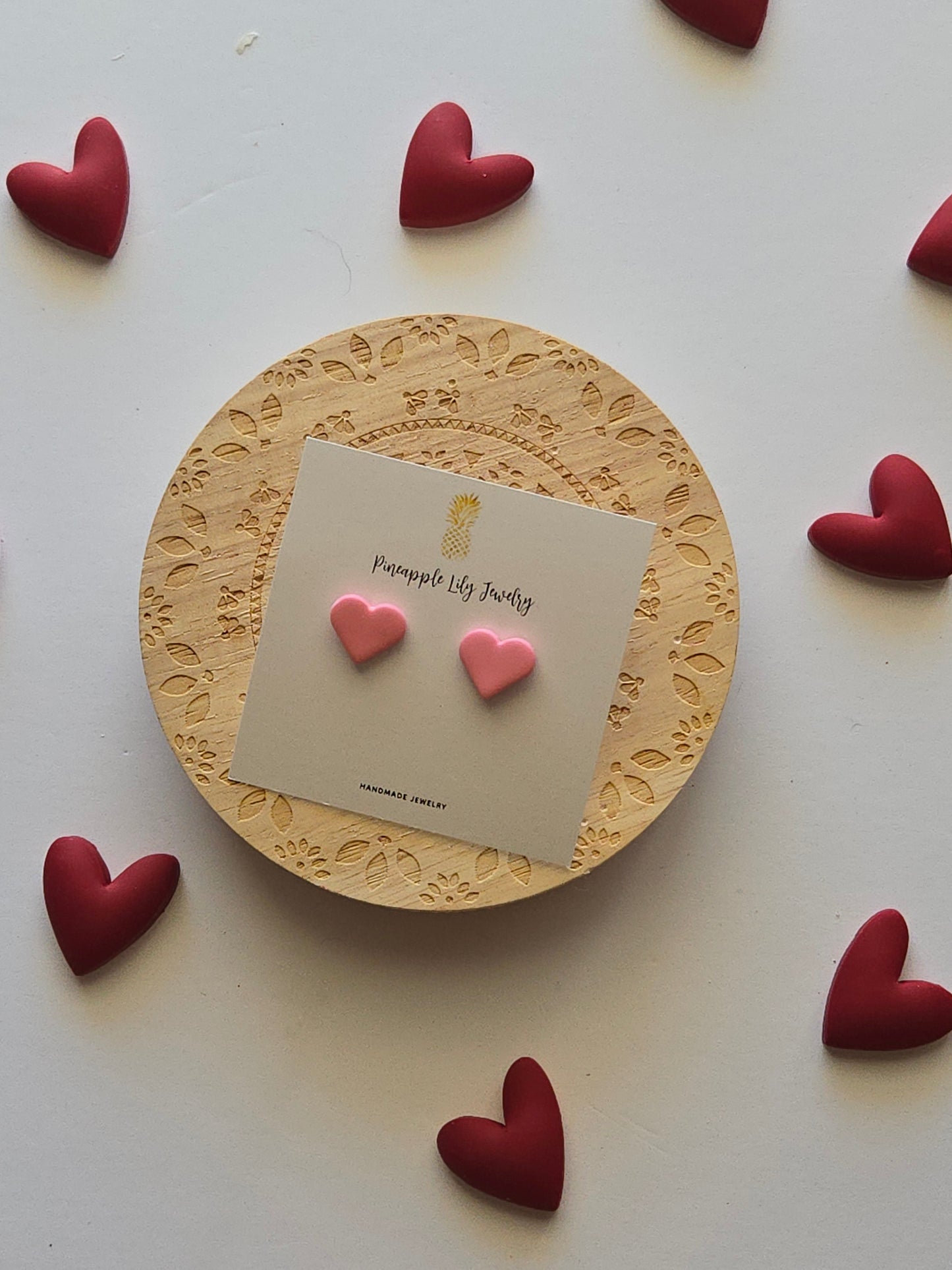 Pink heart studs