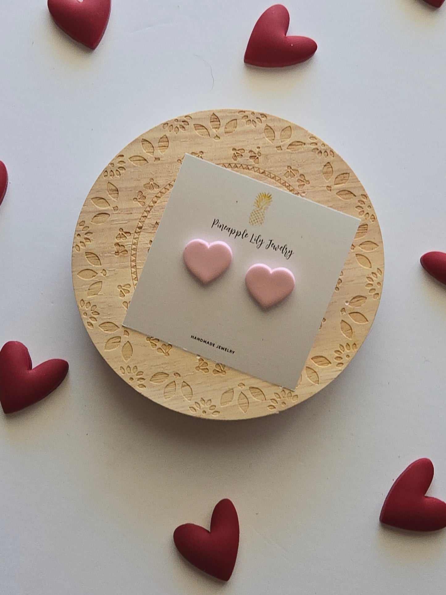 Light pink heart studs