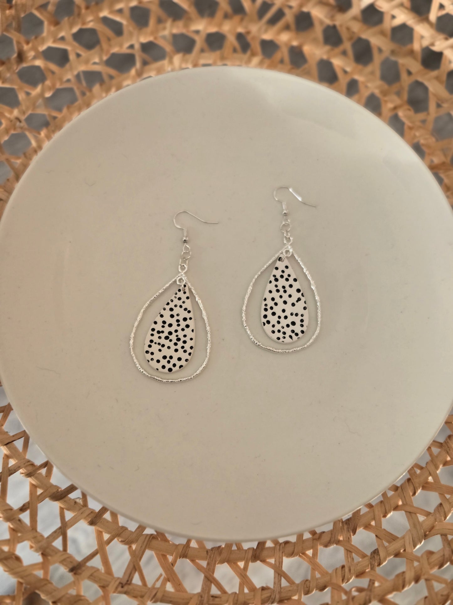 Black and white polka dots statement earrings