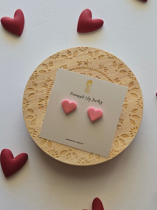 Pink heart studs