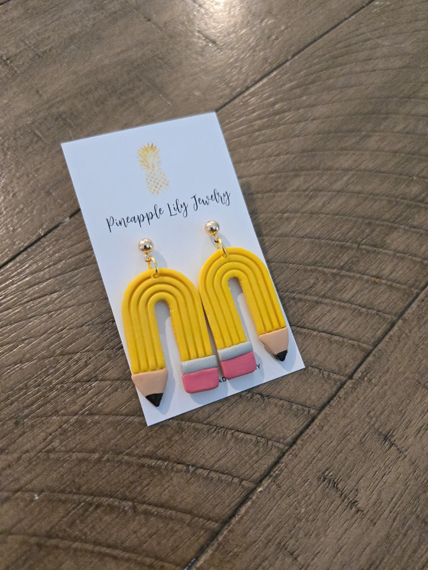 Pencil dangle earrings