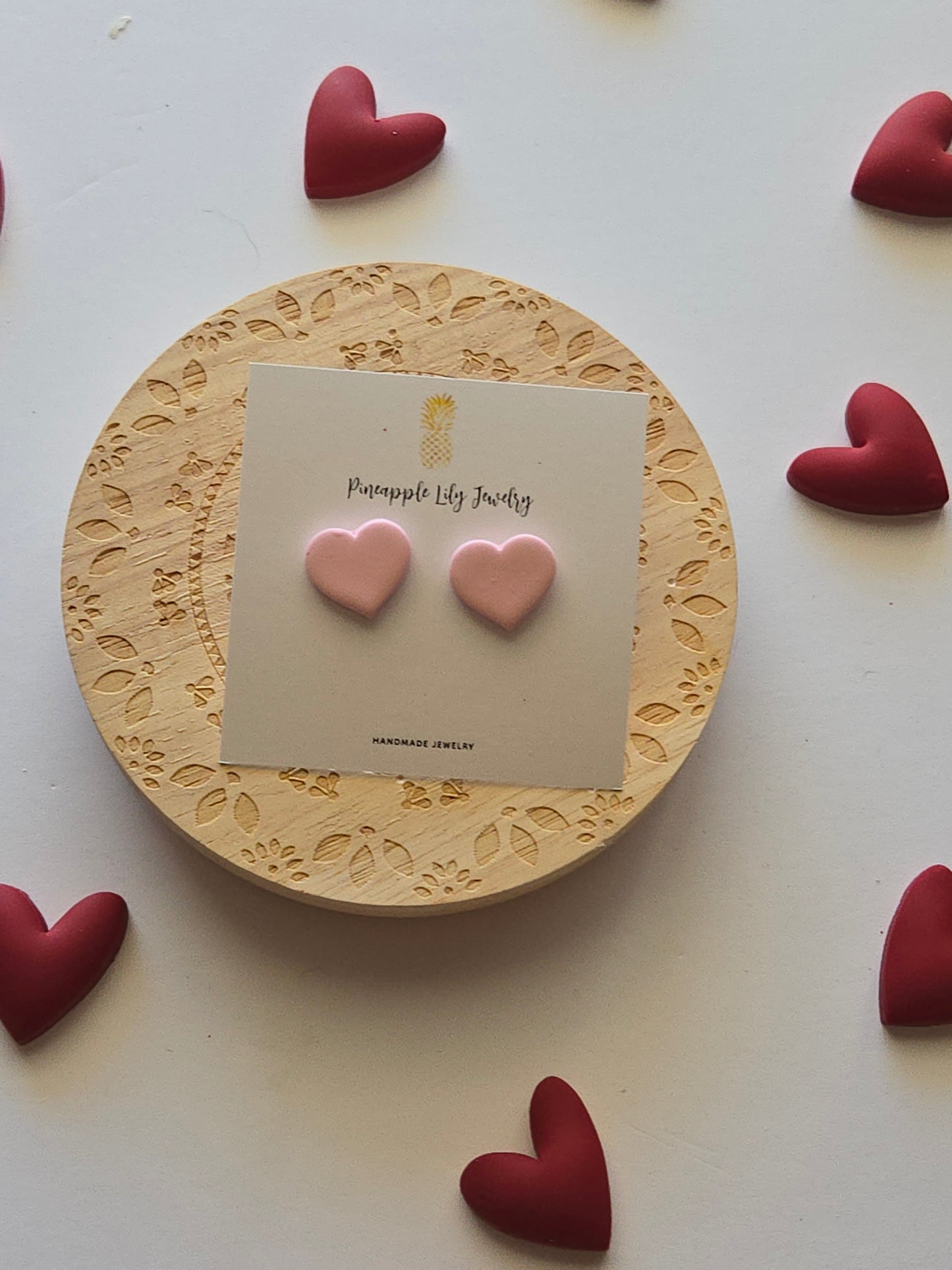 Light pink heart studs