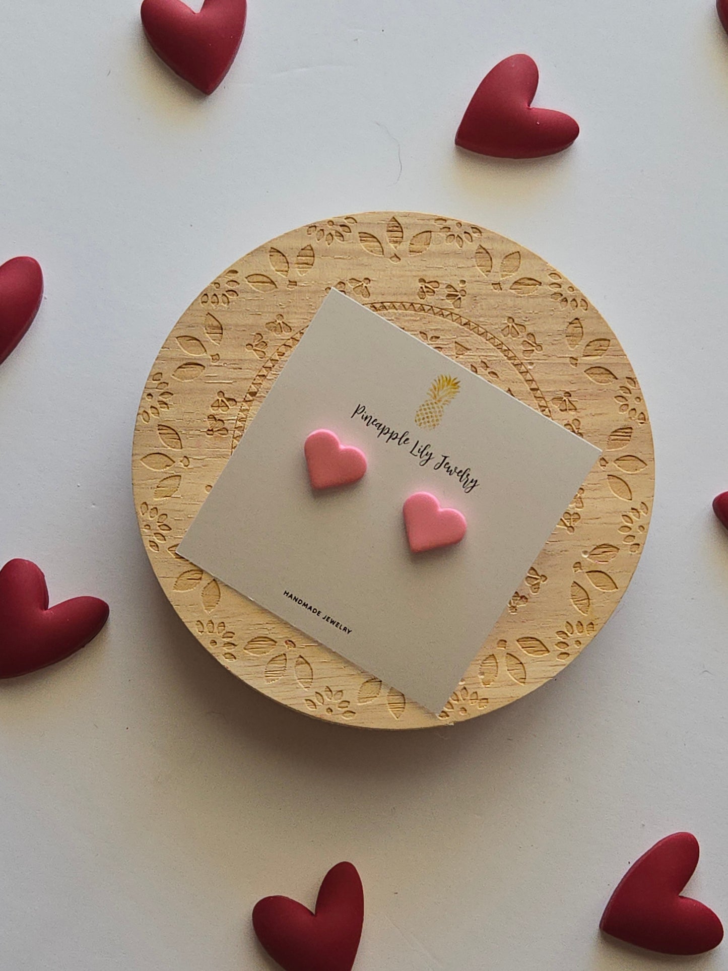 Pink heart studs