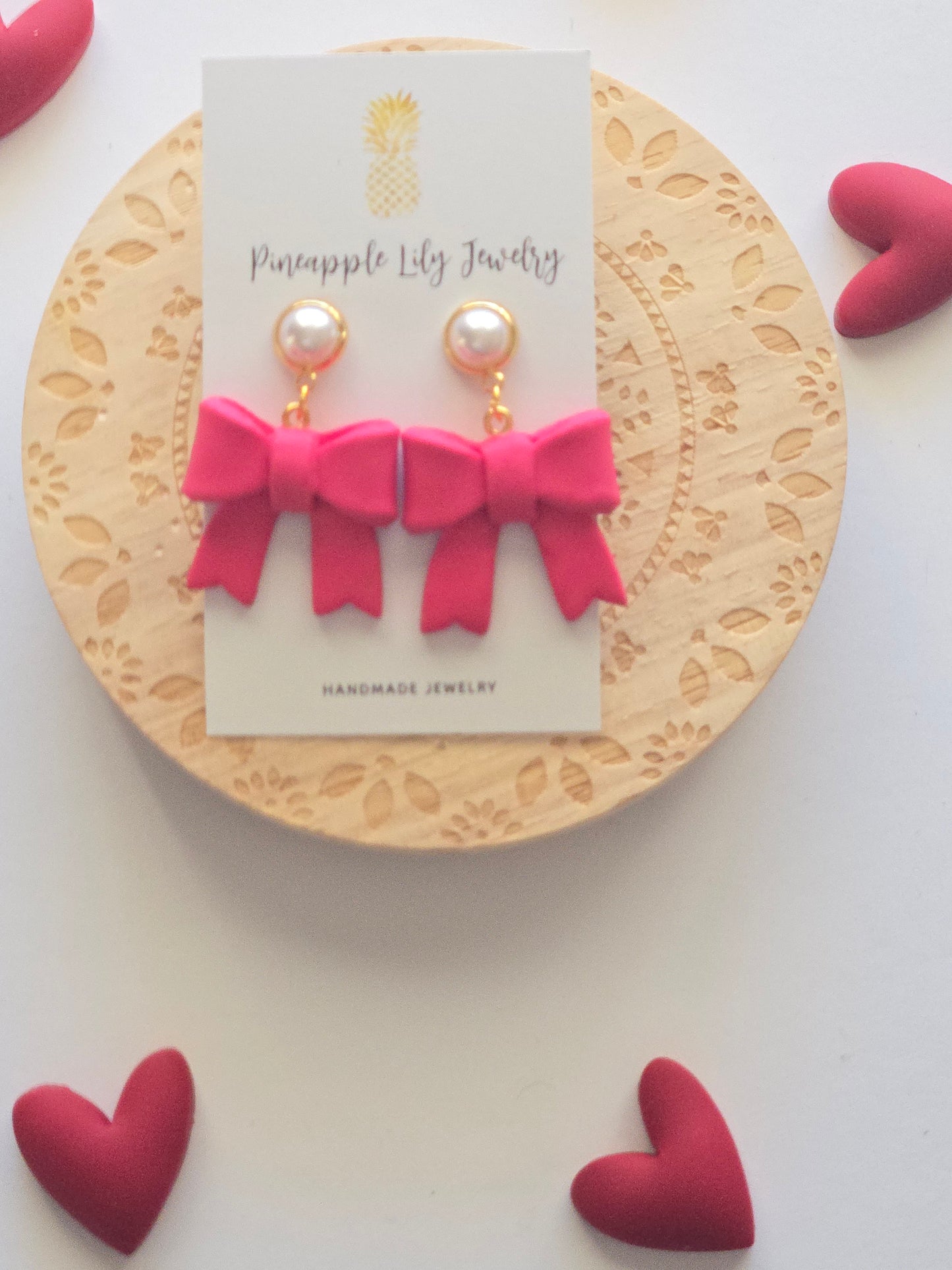 Pink bow dangles with Pearls