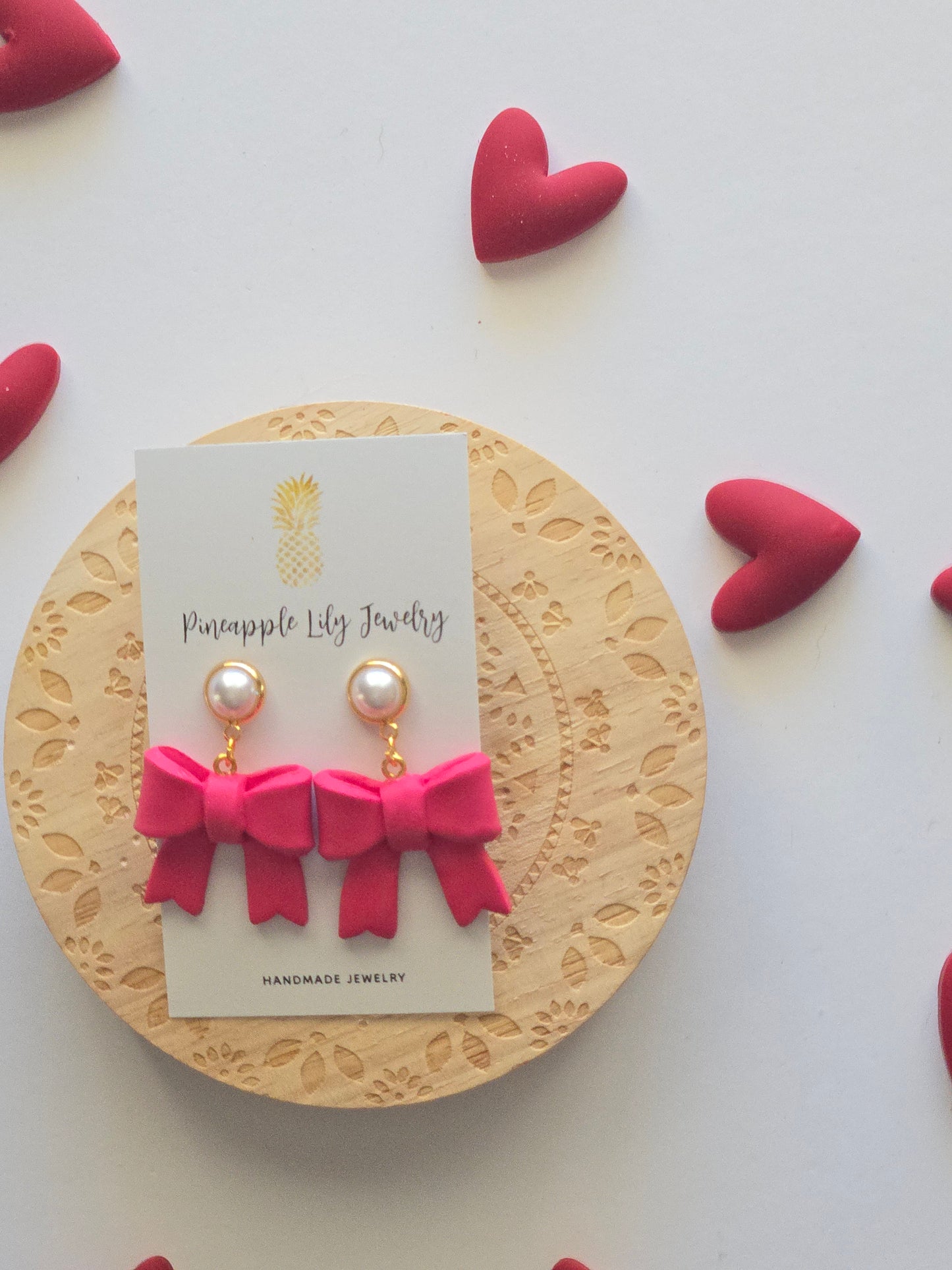 Pink bow dangles with Pearls
