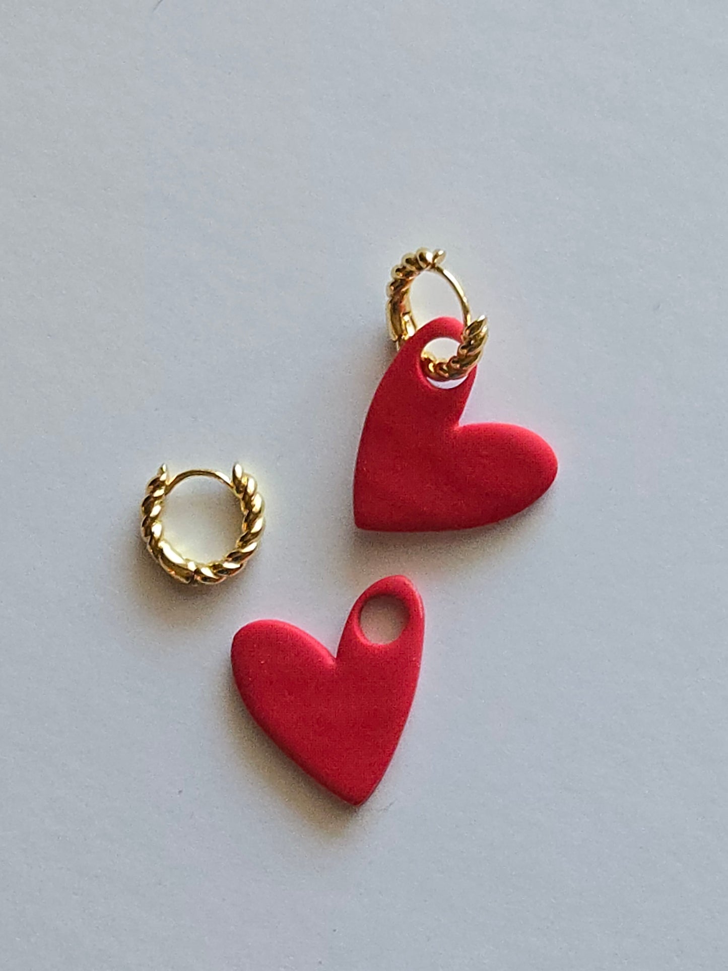 Interchangeable hoop earrings with heart dangles