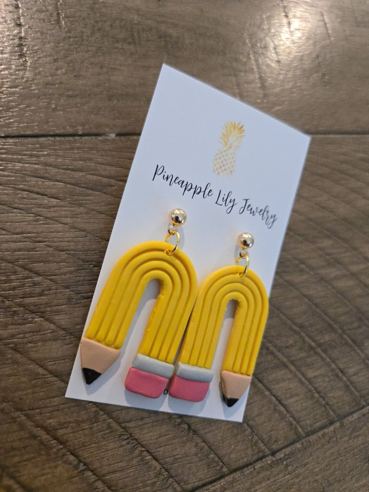 Pencil dangle earrings