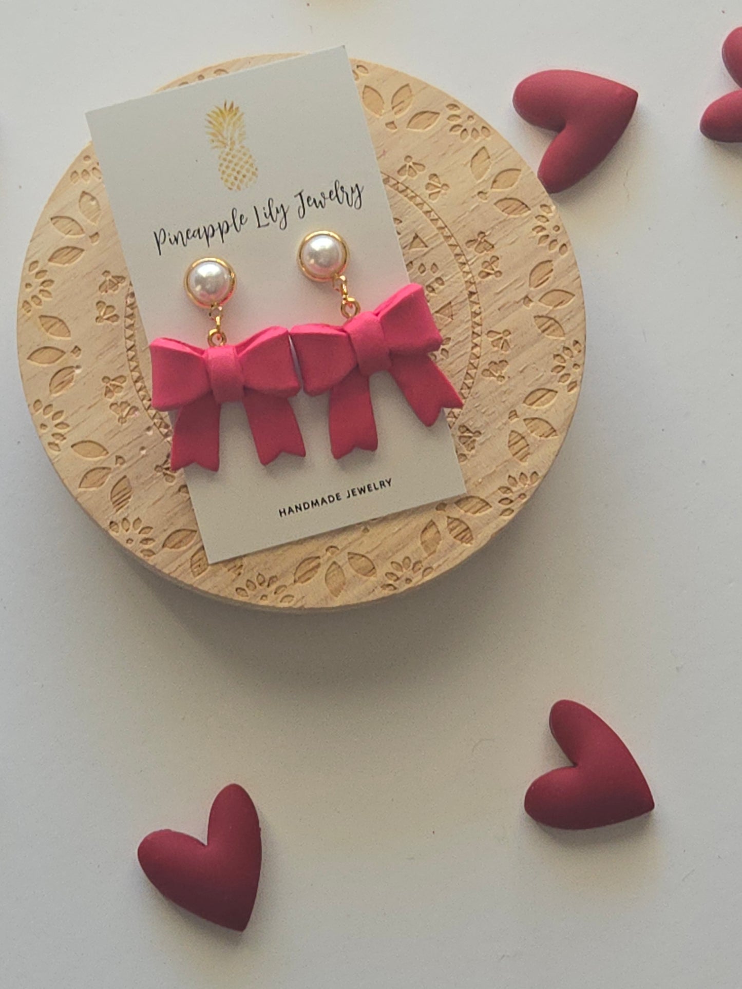 Pink bow dangles with Pearls