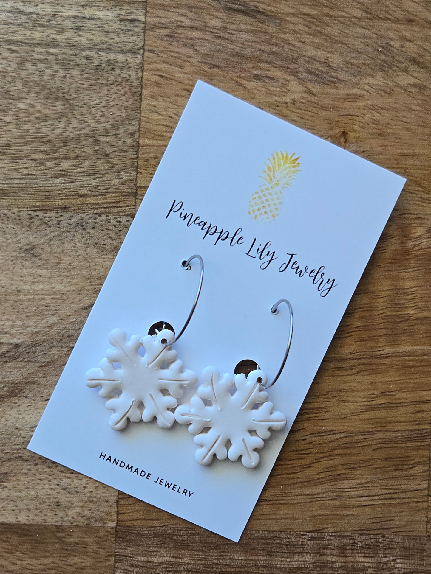 Snowflake hoop earrings