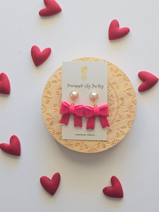 Pink bow dangles with Pearls